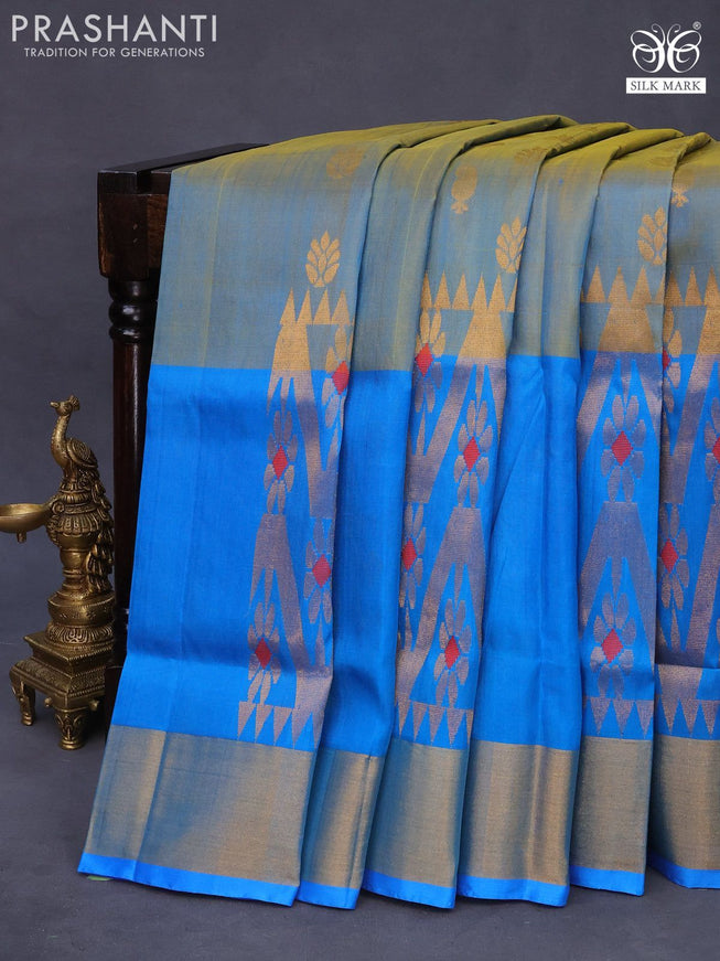 Pure uppada silk saree dual shade of bluish yellow and cs blue with allover zari woven buttas and long zari woven border