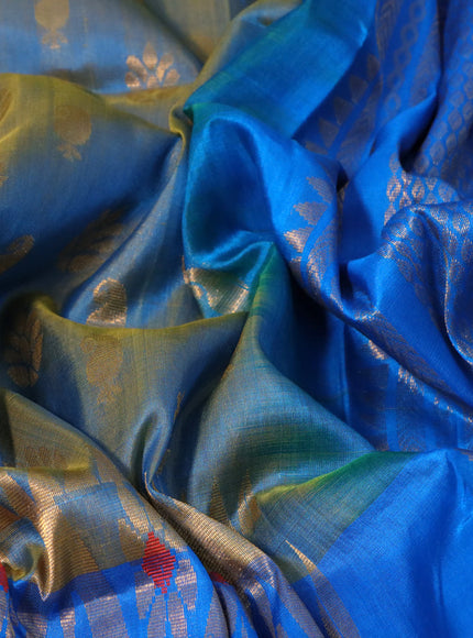 Pure uppada silk saree dual shade of bluish yellow and cs blue with allover zari woven buttas and long zari woven border