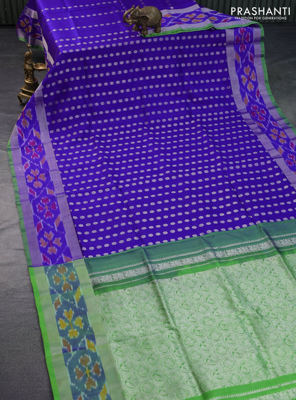 Pure uppada silk saree royal blue and light green with allover silver zari woven buttas and silver zari woven ikat border