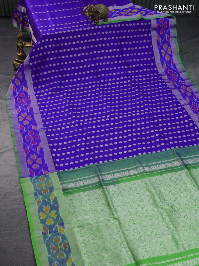 Pure uppada silk saree royal blue and light green with allover silver zari woven buttas and silver zari woven ikat border