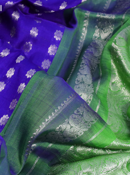 Pure uppada silk saree royal blue and light green with allover silver zari woven buttas and silver zari woven ikat border