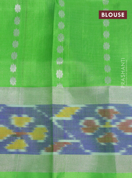 Pure uppada silk saree royal blue and light green with allover silver zari woven buttas and silver zari woven ikat border