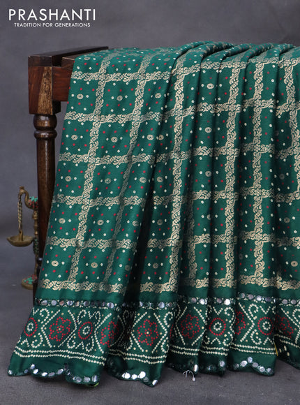 Semi georgette saree dark green with allover bandhani prints and mirror work printed border