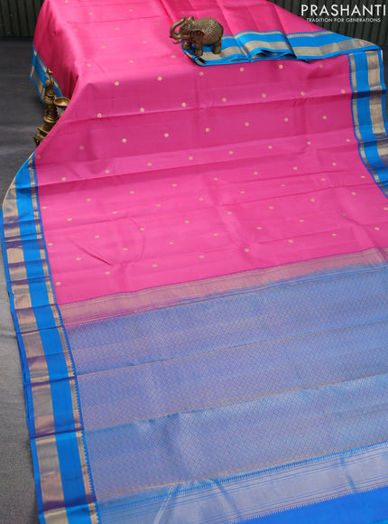 Pure kanchipuram silk saree pink and cs blue with zari woven buttas and rettapet zari woven border