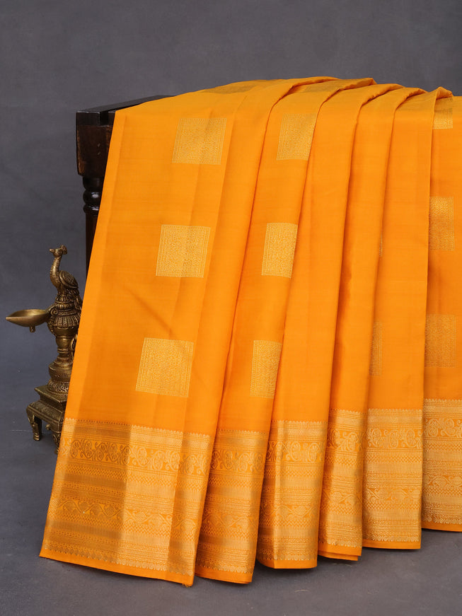 Pure kanchipuram silk saree dark mustard and dual shade of pinkish orange with zari woven box type buttas and zari woven border