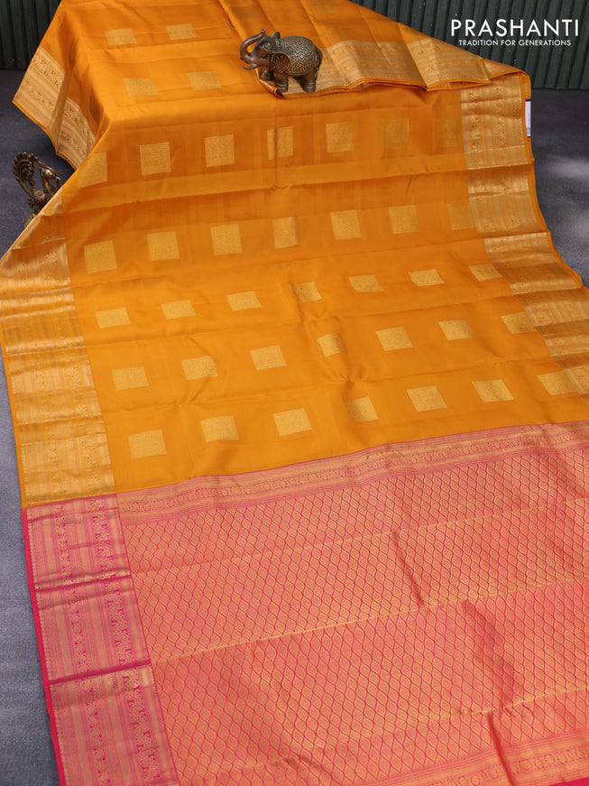 Pure kanchipuram silk saree dark mustard and dual shade of pinkish orange with zari woven box type buttas and zari woven border