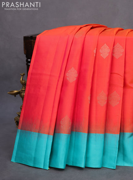 Pure kanchipuram silk saree dual shade of pinkish orange and teal green with zari woven buttas and simple border