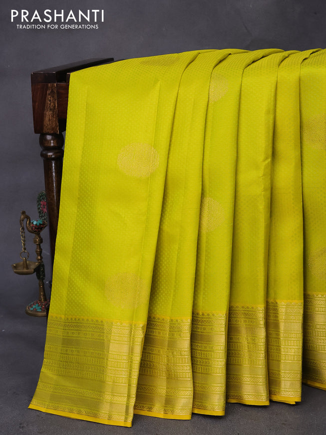 Pure kanchipuram silk saree lime yellow and teal blue with allover self emboss & zari buttas and zari woven border