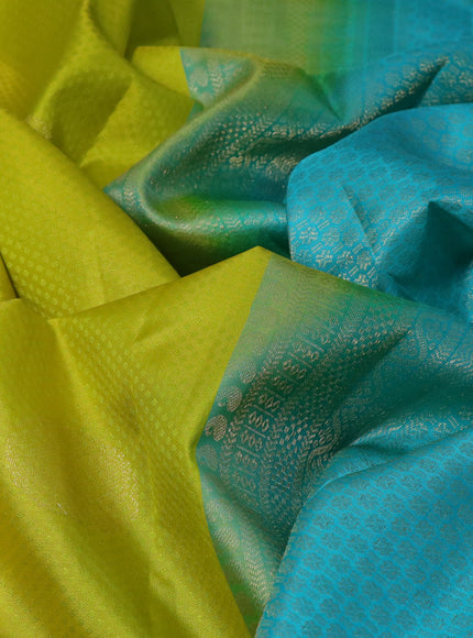 Pure kanchipuram silk saree lime yellow and teal blue with allover self emboss & zari buttas and zari woven border