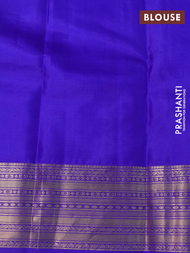 Pure kanchipuram silk saree dual shade of teal bluish green and blue with allover self emboss & zari buttas and zari woven border