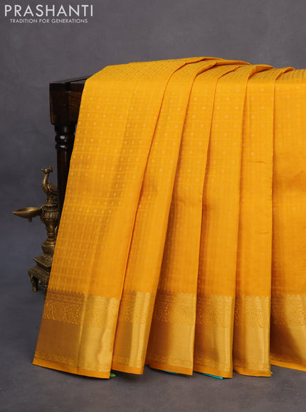 Pure kanchipuram silk saree mustard yellow and teal blue with allover self emboss & zari buttas and zari woven border