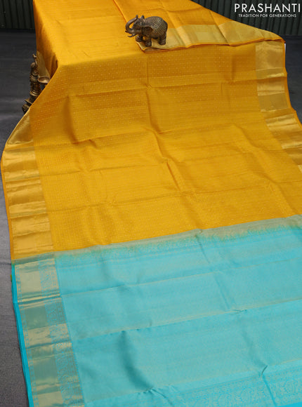 Pure kanchipuram silk saree mustard yellow and teal blue with allover self emboss & zari buttas and zari woven border