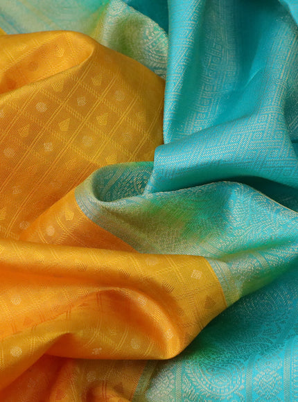 Pure kanchipuram silk saree mustard yellow and teal blue with allover self emboss & zari buttas and zari woven border