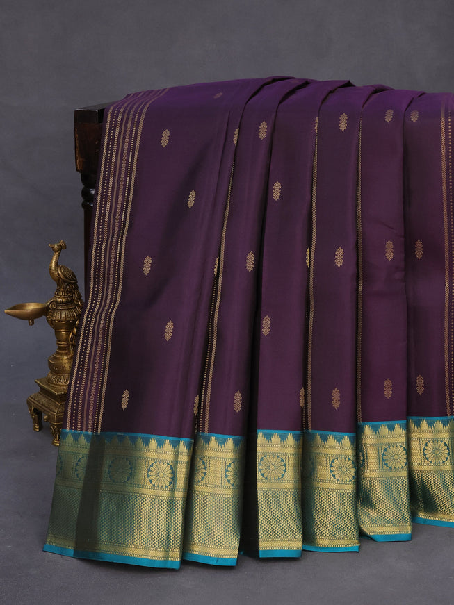 Pure kanchipuram silk saree wine shade and teal green shade with allover zari weaves & buttas and zari woven border