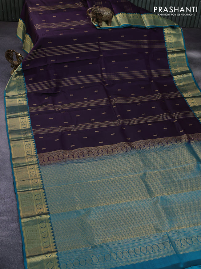 Pure kanchipuram silk saree wine shade and teal green shade with allover zari weaves & buttas and zari woven border