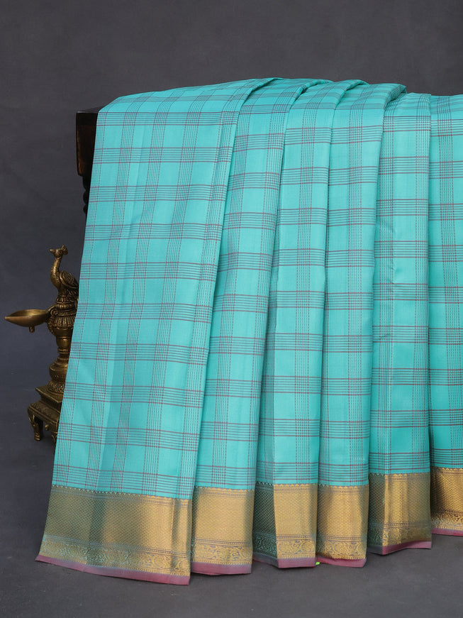 Pure kanchipuram silk saree teal blue and dark pink with allover checked pattern and zari woven korvai border