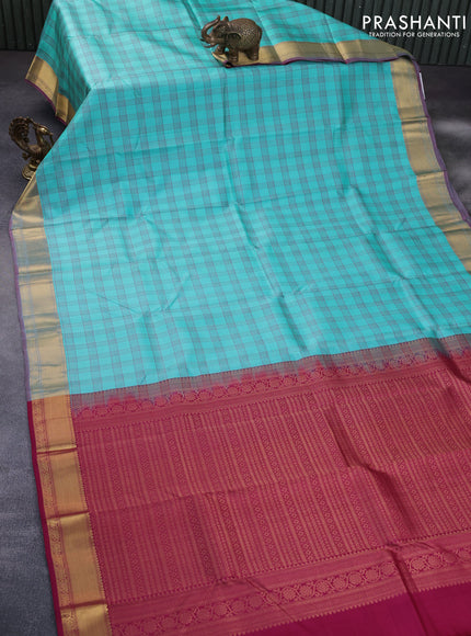 Pure kanchipuram silk saree teal blue and dark pink with allover checked pattern and zari woven korvai border