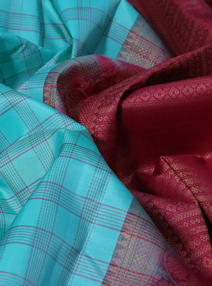 Pure kanchipuram silk saree teal blue and dark pink with allover checked pattern and zari woven korvai border