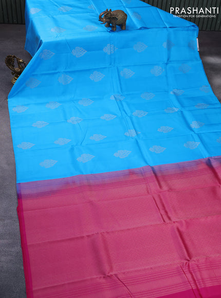 Pure kanchipuram silk saree light blue and dark pink with zari woven buttas in borderless style