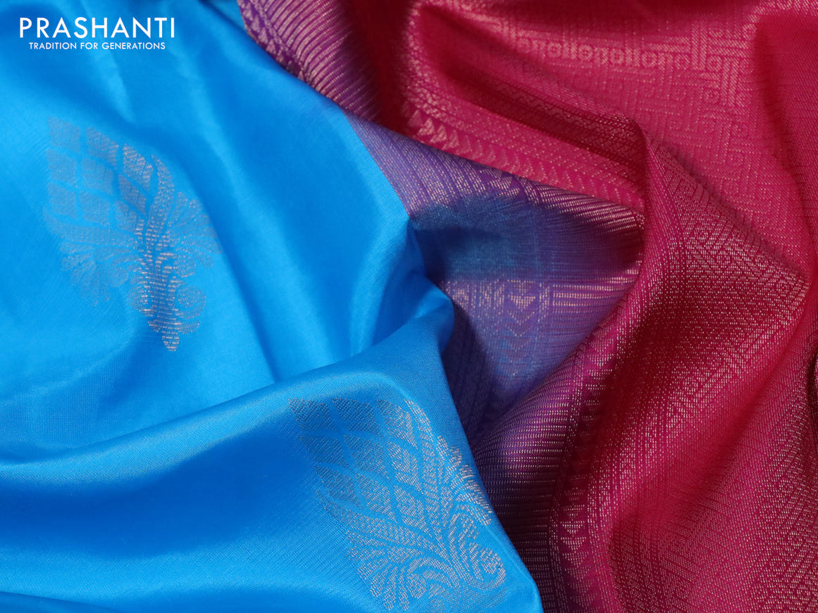 Pure kanchipuram silk saree light blue and dark pink with zari woven buttas in borderless style