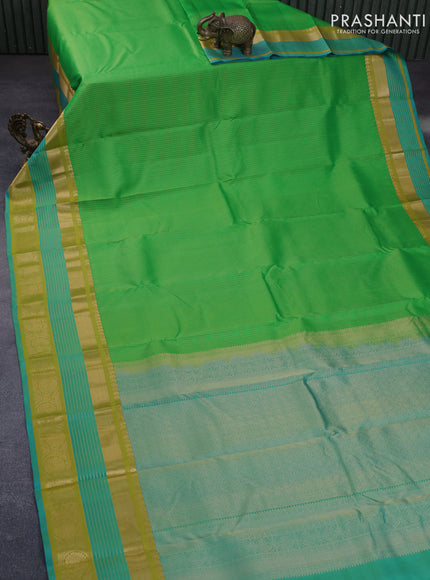 Pure kanchipuram silk saree green and dual shade of blue with allover zari woven stripe pattern and long rich zari woven border