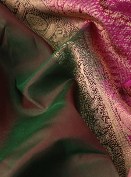 Pure kanchipuram silk saree dual shade of green and pink with plain body and small zari woven border