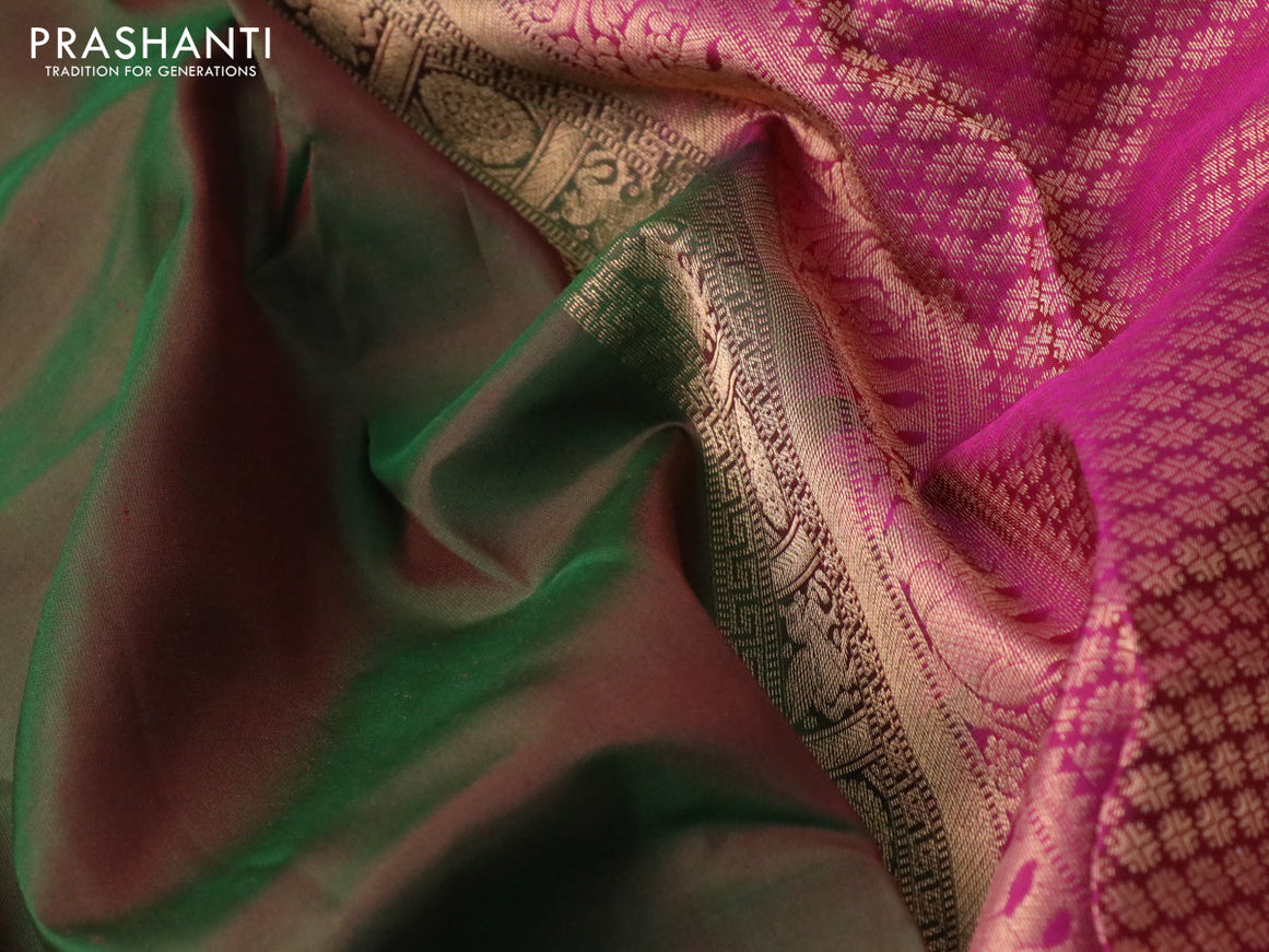 Pure kanchipuram silk saree dual shade of green and pink with plain body and small zari woven border