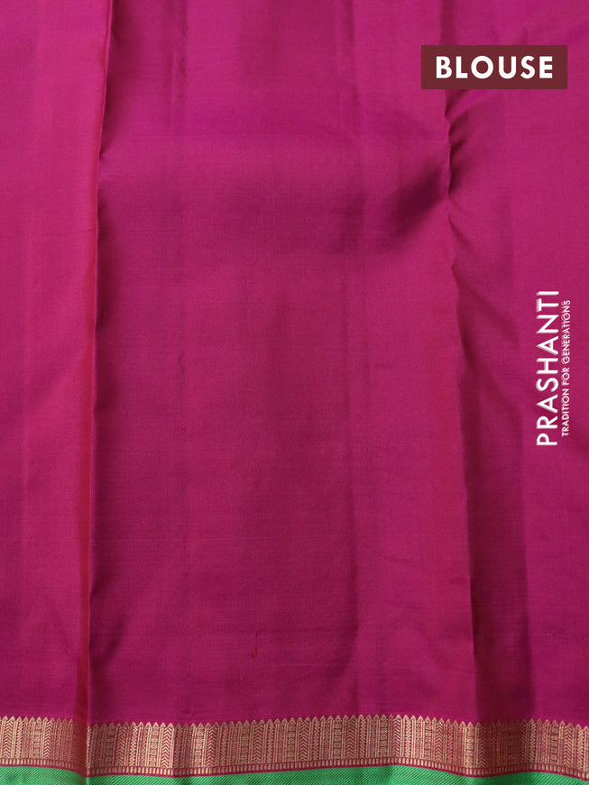 Pure kanchipuram silk saree dual shade of green and pink with plain body and small zari woven border