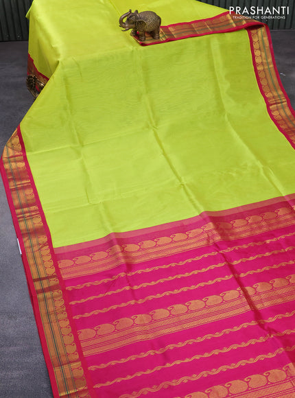 Silk cotton saree flourescent green and pink with plain body and paisleybzari woven korvai border