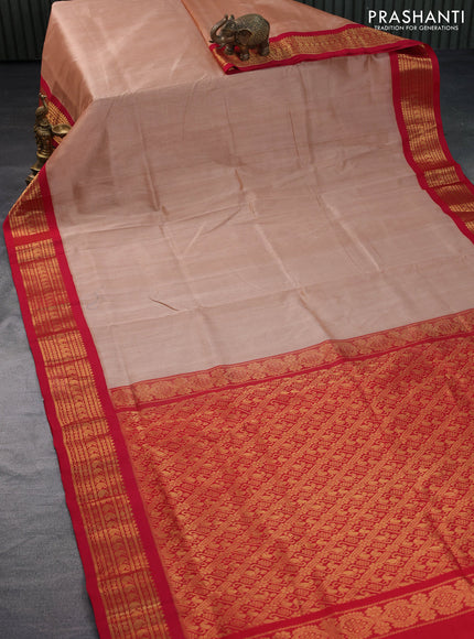 Silk cotton saree pastel peach and red with plain body and zari woven korvai border