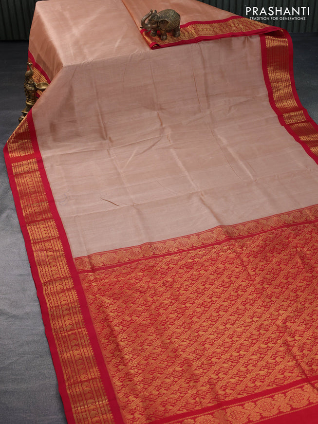 Silk cotton saree pastel peach and red with plain body and zari woven korvai border