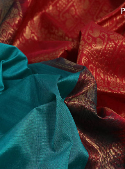 Silk cotton saree teal blue shade and red with plain body and zari woven korvai border