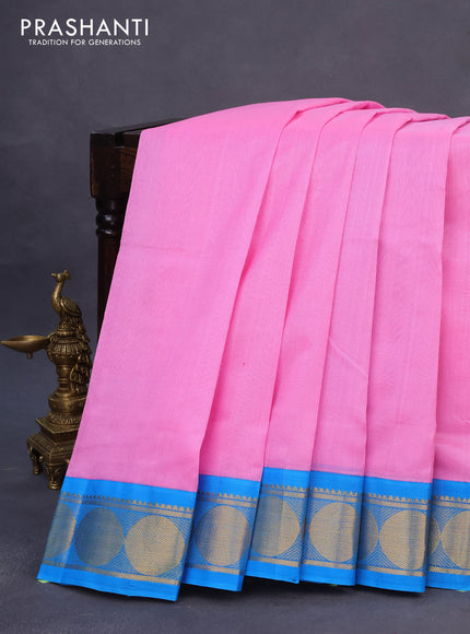 Silk cotton saree light pink and blue with plain body and rudhraksha zari woven korvai border