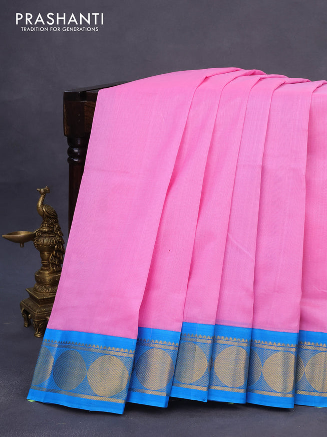 Silk cotton saree light pink and blue with plain body and rudhraksha zari woven korvai border