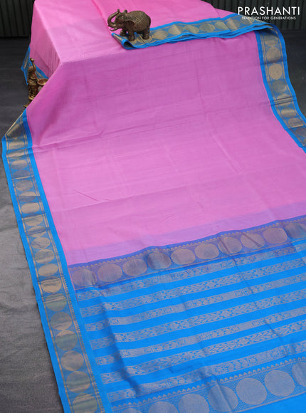 Silk cotton saree light pink and blue with plain body and rudhraksha zari woven korvai border