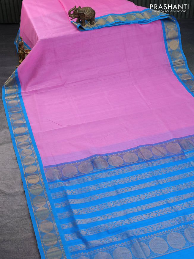 Silk cotton saree light pink and blue with plain body and rudhraksha zari woven korvai border