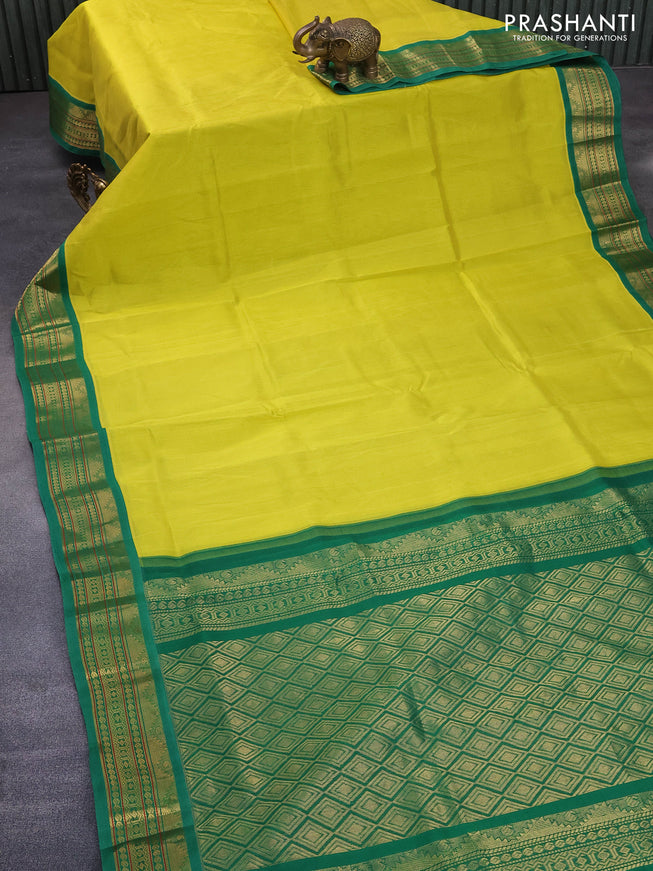 Silk cotton saree lime yellow and green with plain body and zari woven korvai border