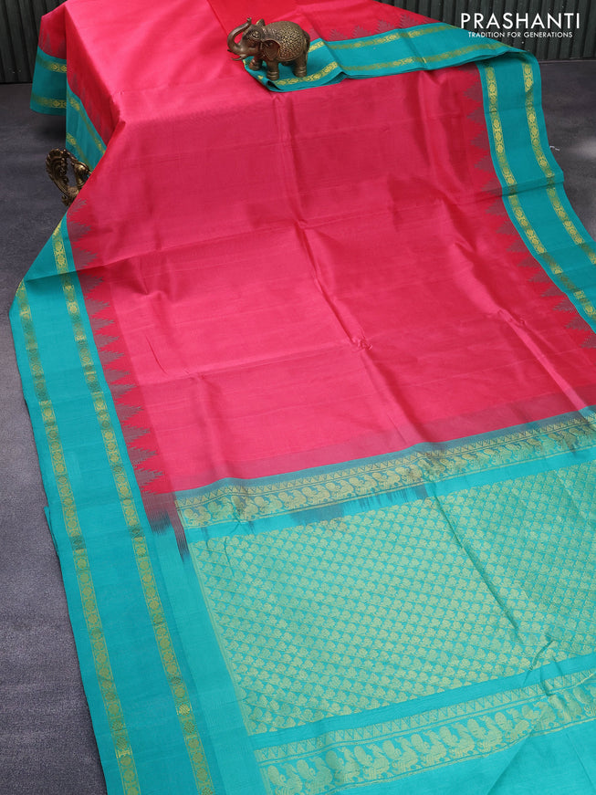 Silk cotton saree pink and teal green with plain body and temple design rettapet zari woven border