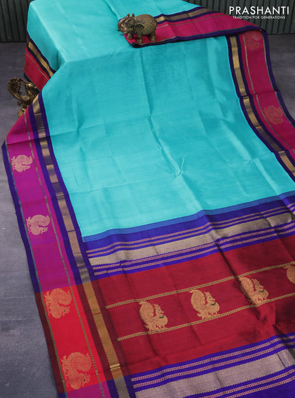 Silk cotton saree teal blue and blue with plain body and zari woven butta border