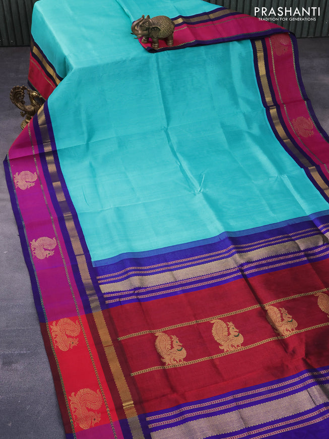 Silk cotton saree teal blue and blue with plain body and zari woven butta border