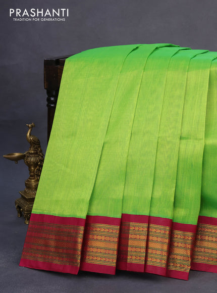 Silk cotton saree light green and dark pink with plain body and zari woven korvai border