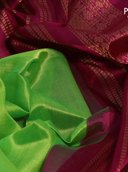 Silk cotton saree light green and dark pink with plain body and zari woven korvai border