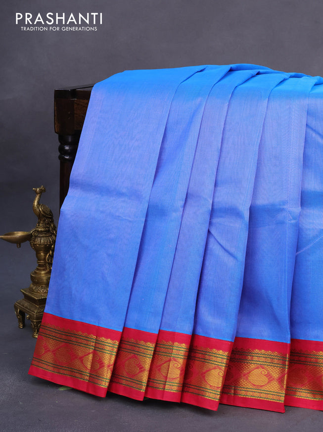 Silk cotton saree blue and pink with plain body and zari woven korvai border