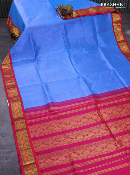 Silk cotton saree blue and pink with plain body and zari woven korvai border