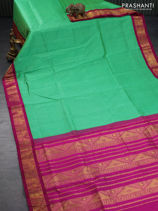 Silk cotton saree teal green and magenta pink with allover vairaosi pattern and zari woven korvai border