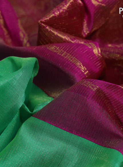 Silk cotton saree teal green and magenta pink with allover vairaosi pattern and zari woven korvai border