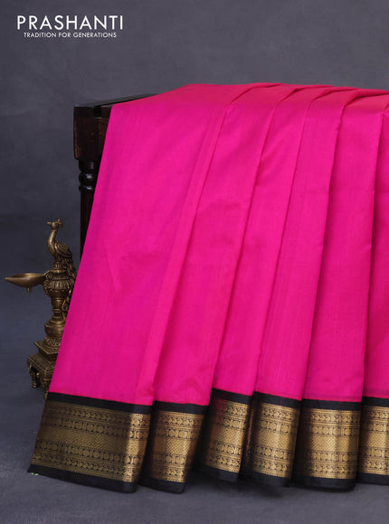 Kuppadam silk cotton saree dark pink and black with plain body and zari woven border