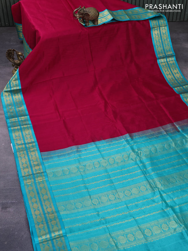 Kuppadam silk cotton saree kumkum red and teal blue with plain body and zari woven border