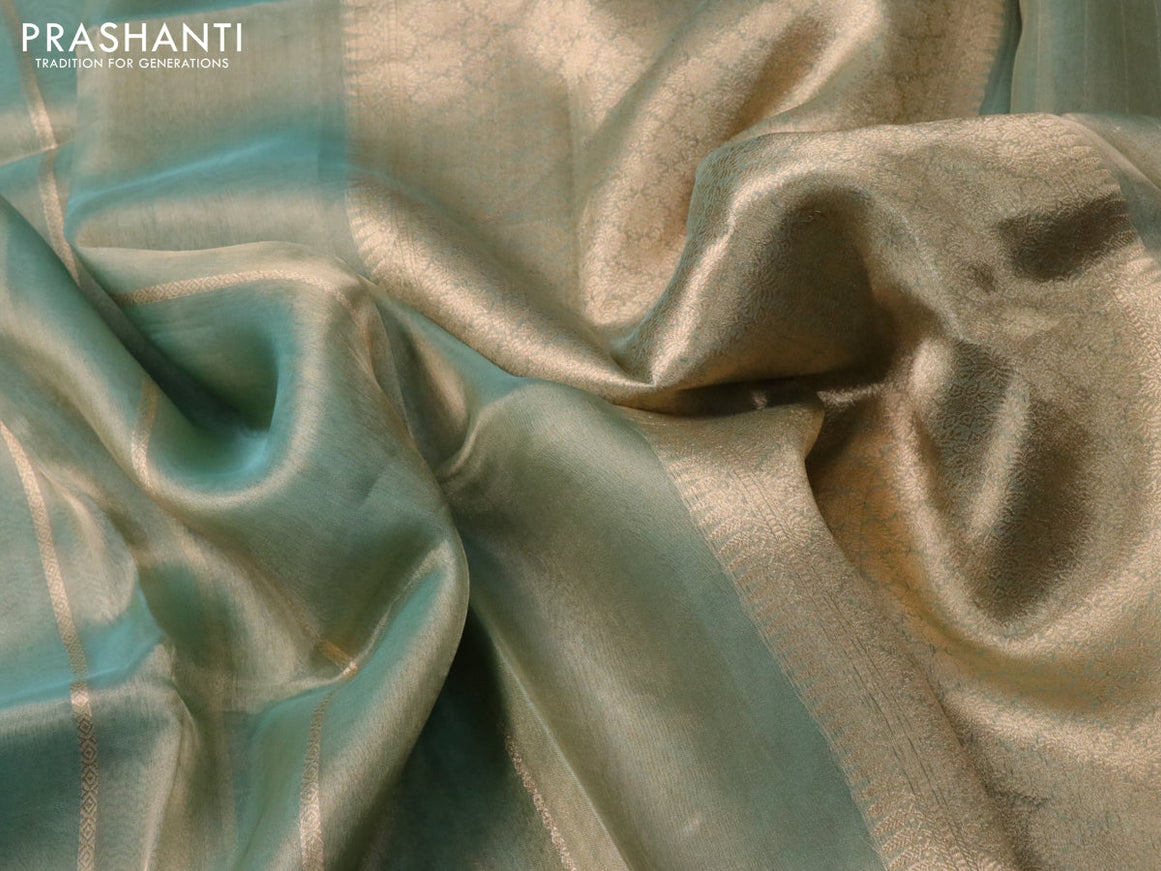 Banarasi tissue silk saree teal green shade with allover zari weaves and zari woven butta border