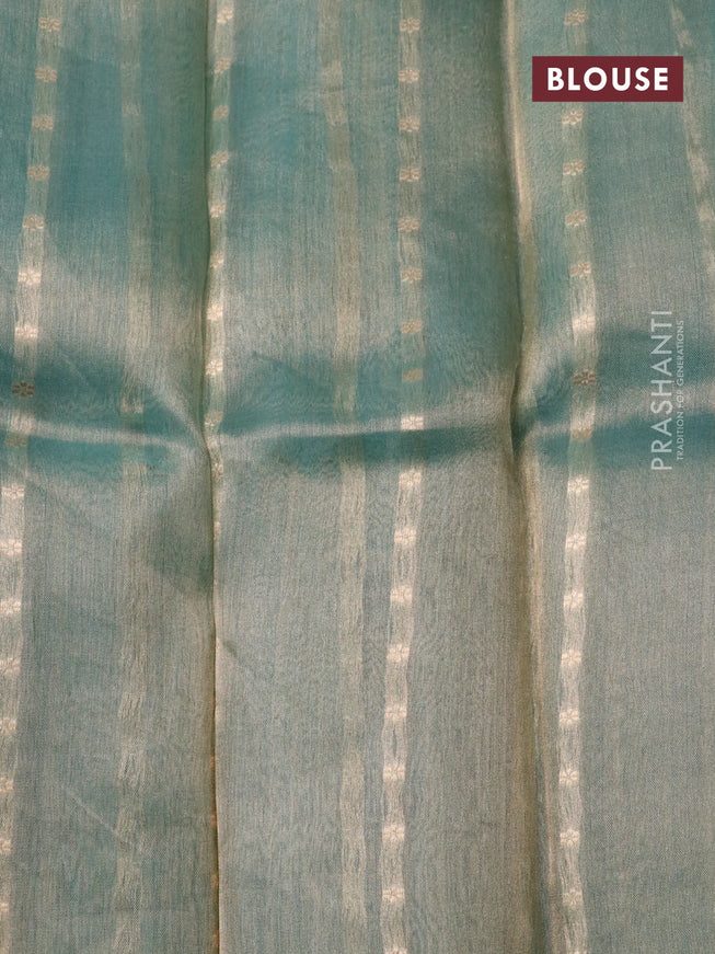 Banarasi tissue silk saree teal blue with allover zari weaves and zari woven butta border